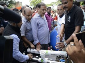 CM inspects our water filter unit in Cachar 