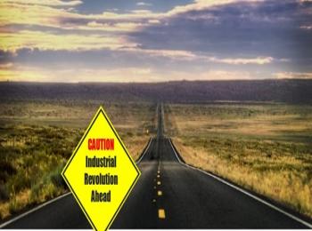 A picture of a road with fields on both sides