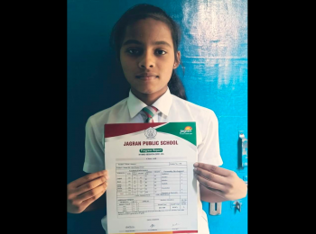 Ananya with her mark sheet