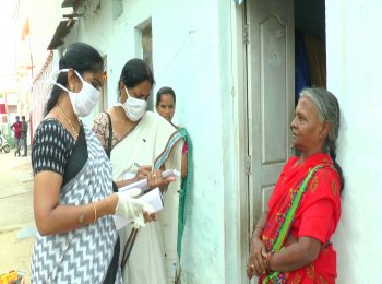 Bhagyamma outside her house talking to the MARI volunteers 