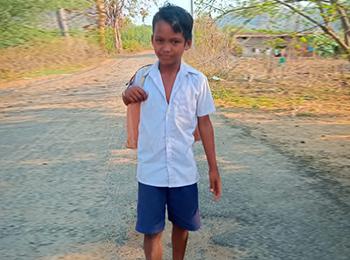 Ajay, a class four student, who was supported by Oxfam India