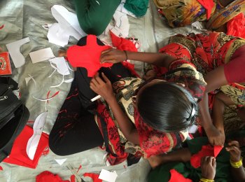 Women and girls, affected by floods, being trained to make pads during Oxfam India's Tamil Nadu response 