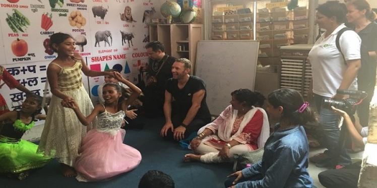 Chris Martin visits education project of Oxfam India in Delhi