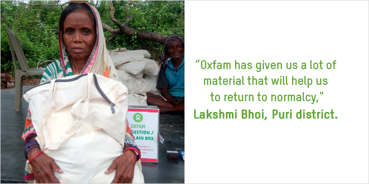 Lakshmi Bhoi with safety and shelter kit provided by Oxfam India