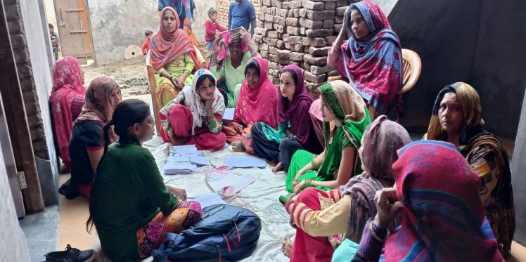 Women sugercane farmers applying for Ayushman Bharat scheme Muzaffarnager