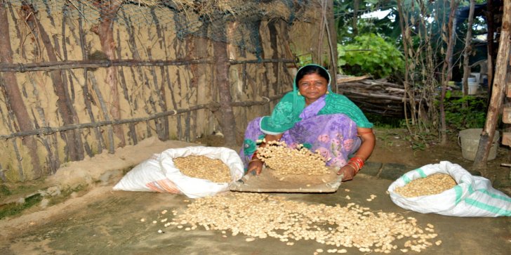 Gitanjali with the groundnuts she bought with the cash she received from Oxfam India 